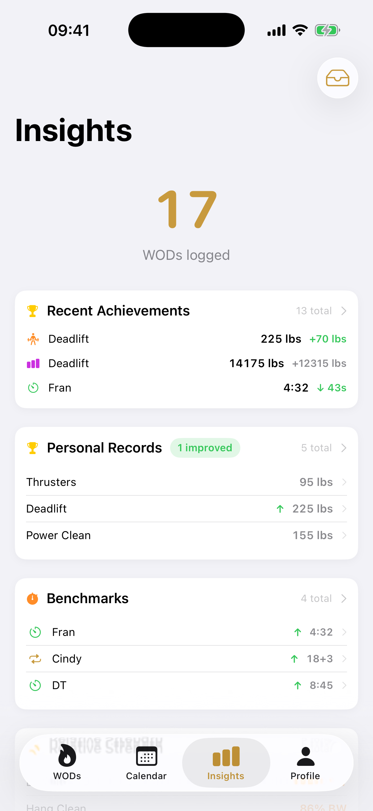 Insights tab with logged WODs, recent achievements, personal records, and benchmarks